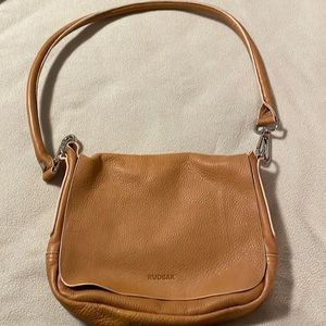 Rudsak saddle bag. Comes with detachable bag that can be used as a makeup bag